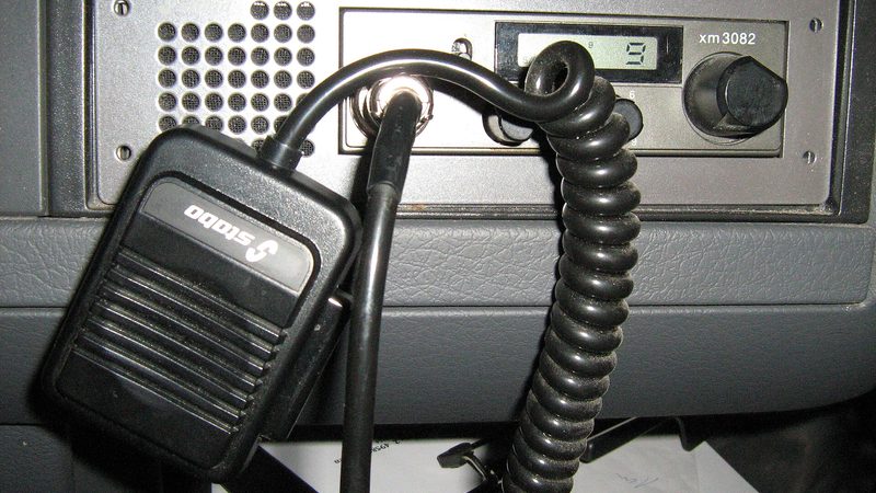 A CB radio mounted in a truck, the object this guide is actually about