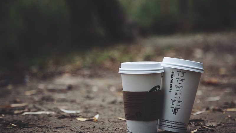Two people sharing coffee, closer to a day off than to another gadget in the bunk