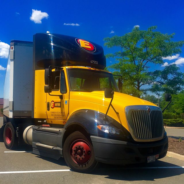 An Estes truck in a parking lot