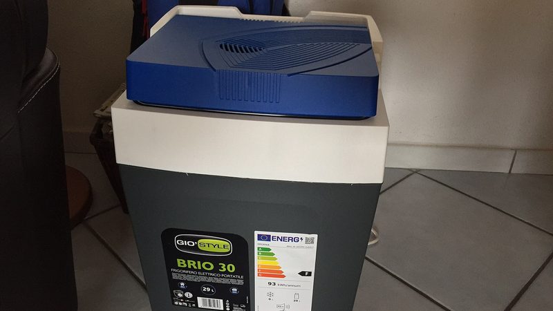 A Gio Style Brio portable compressor fridge with the lid closed