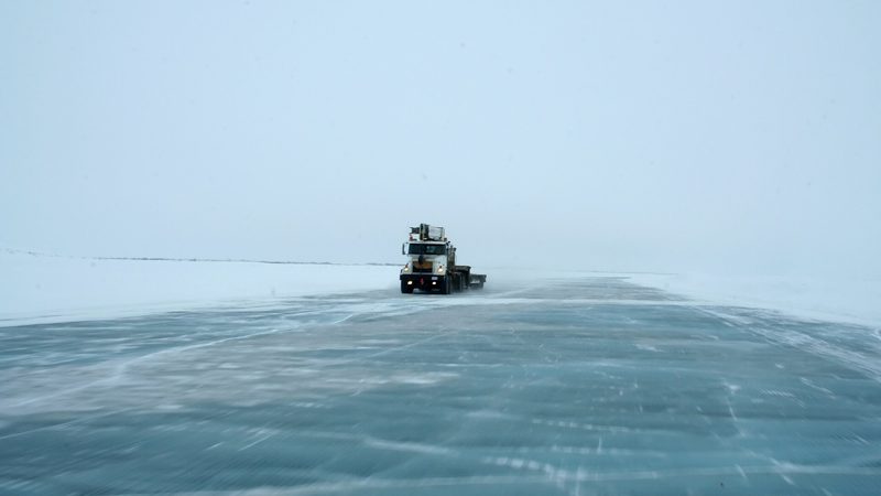Trucks on the Mackenzie River ice road in the Northwest Territories