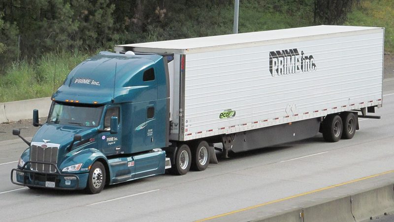 A Prime Inc Peterbilt pulling a refrigerated trailer near Spokane