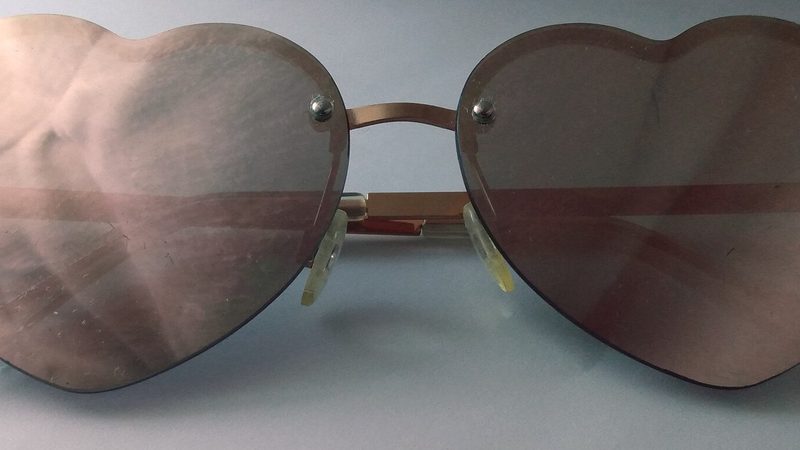 A pair of sunglasses on a plain background, a small gift rather than a medical device